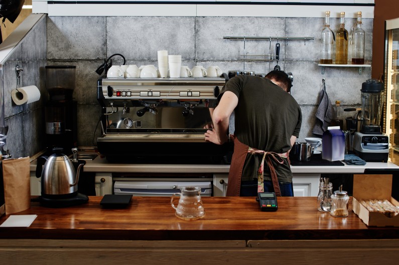 barista working at coffee shop