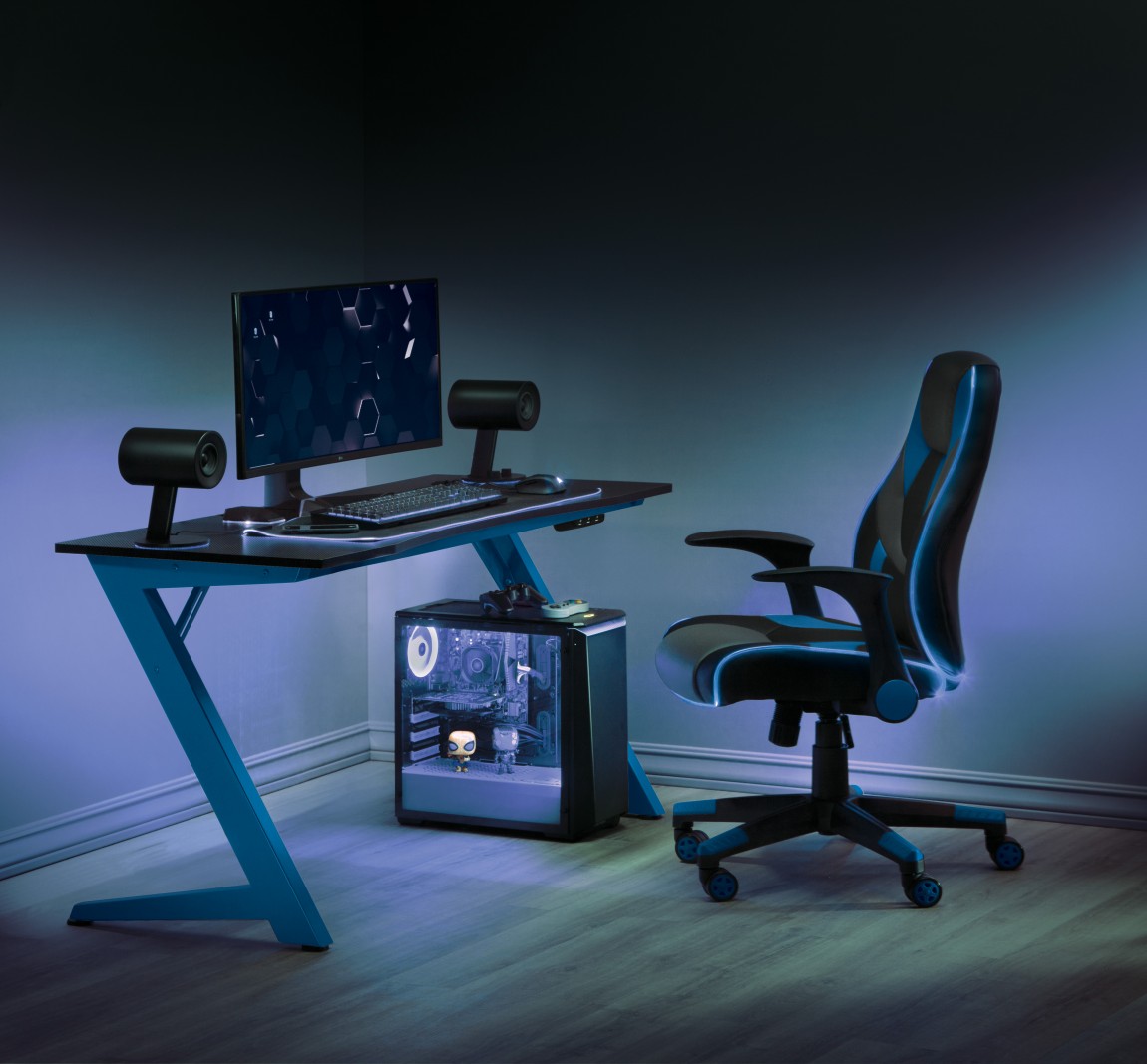Blue LED gaming setup with gaming chair