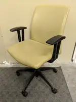 Tan Vinyl Rolling Office Chairs