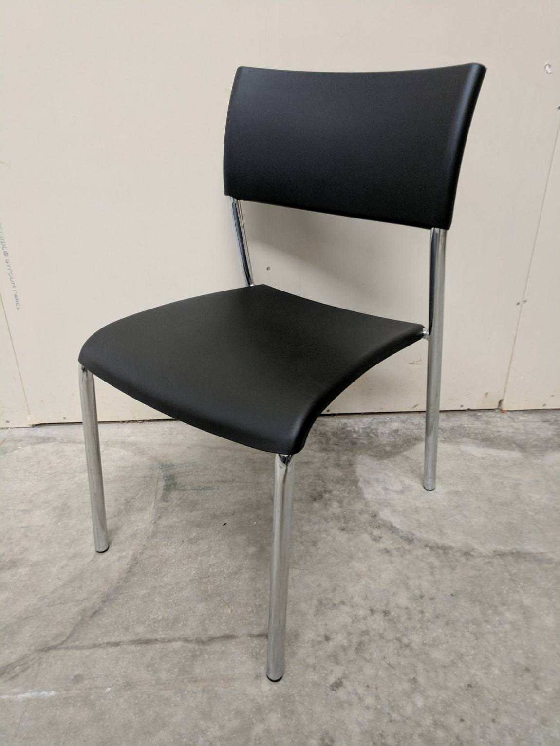 Offices To Go Black Plastic Stacking Guest Chairs 