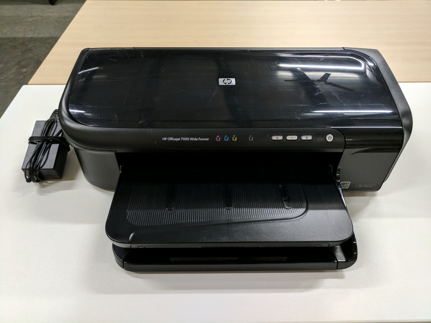 Hp officejet 7000 wide format не берет бумагу